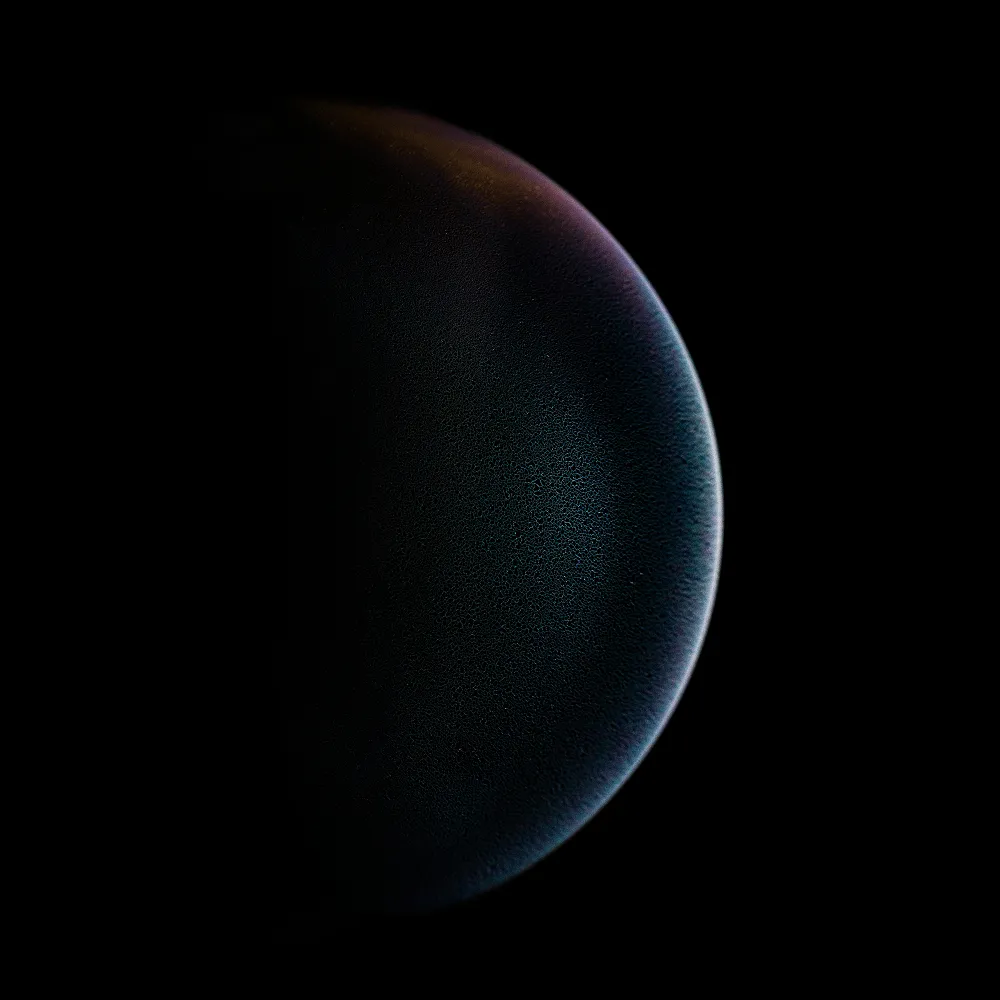 A shimmering planet with dark reds and blues, only the right side visible.